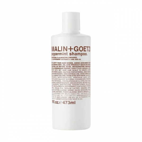 Malin + Goetz Peppermint Shampoo white bottle with brown bloc of text on white background